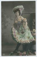 [Woman posed in ruffled and sequined dress with frilly hat] 1136/3