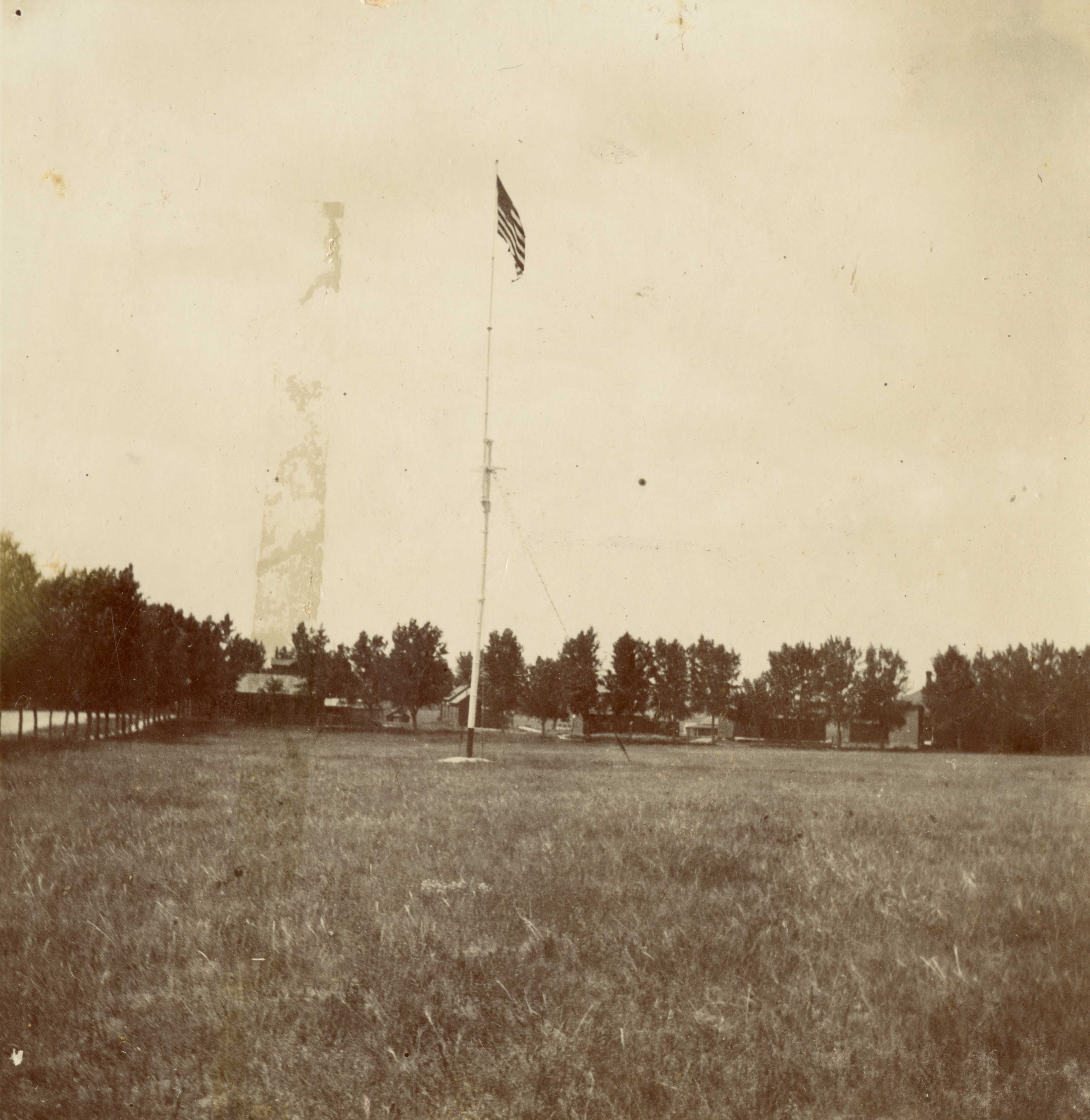 [Flagpole and parade grounds at Fort Robinson, Nebraska]