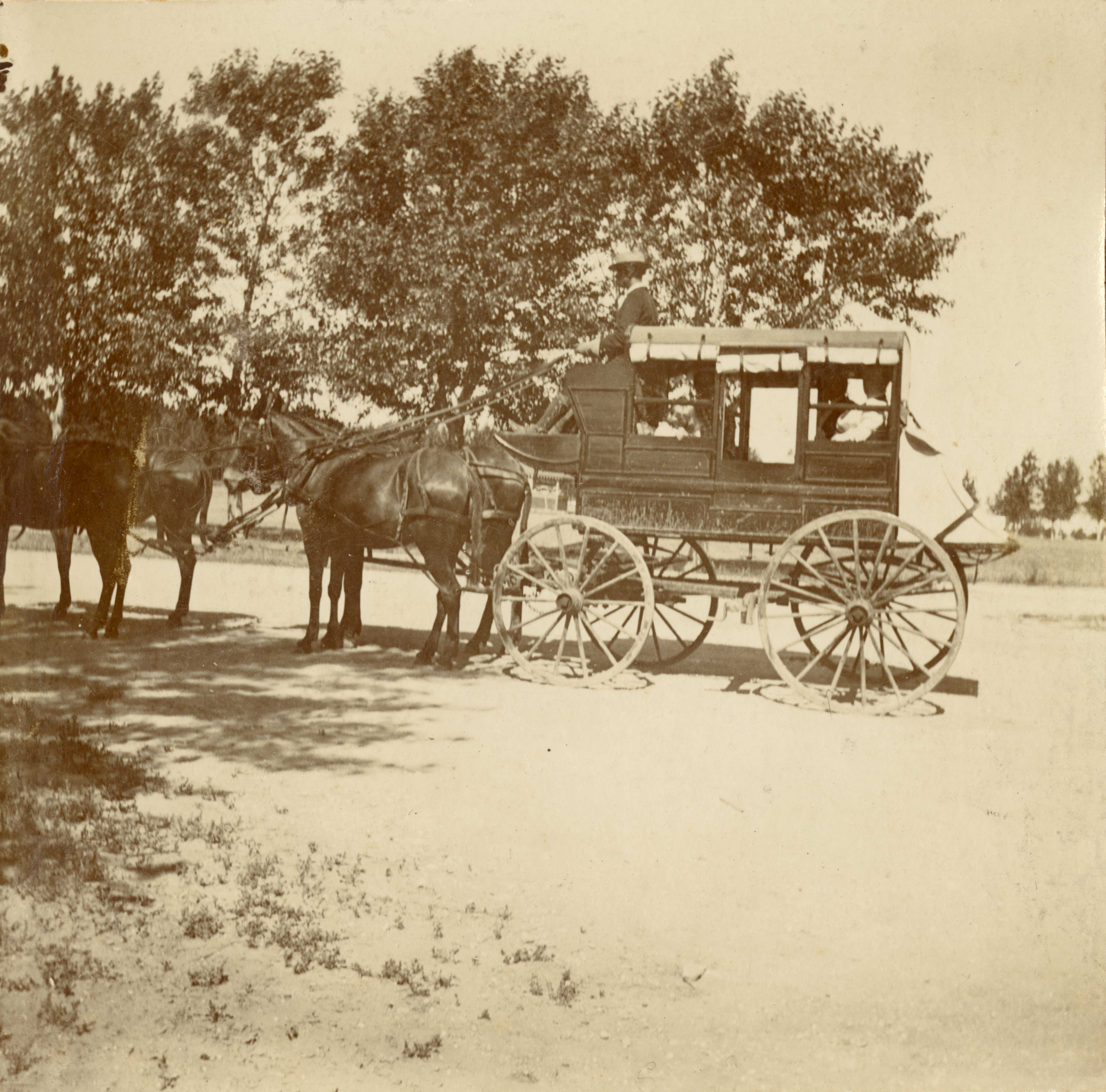 [Stagecoach with passengers, probably at Fort Robinson, Nebraska]
