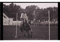 Unidentified rider in Pole bending event