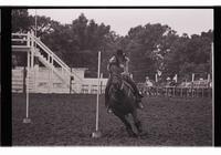 Unidentified rider in Pole bending event