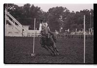 Unidentified rider in Pole bending event