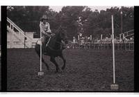 Unidentified rider in Pole bending event