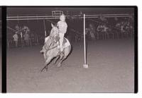 Unidentified rider in Pole bending event