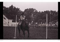 Unidentified rider in Pole bending event