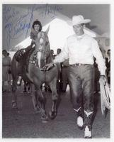 [Junior Eskew leading horse with Linda Allen (McSherry)]