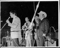 Johnnie Lee Wills and band performing on stage