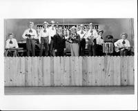 Johnnie Lee Wills and band [band is posing on stage]