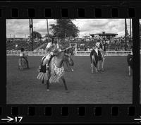 [Unknown Cowgirl on horseback]