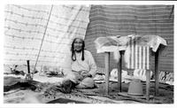Squaw in teepee at Quarter Circle U Ranch, Aug. 1928