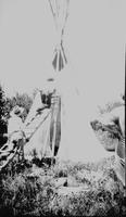 Assembling a teepee Aug 1928 Quarter Circle U Ranch