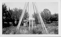 Assembling Mrs. Arnold's teepee Aug 1928 N Pickett