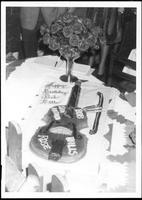 Bob Wills birthday cake cake has San Antonio Rose written on it]