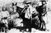 Left to right: Dutchy, General Crook's favorite mule "Apache", General Crook and Alchise