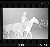 Portrait photograph Bobby James leading horse All Sox