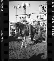 [Unknown Cowboy on horseback]