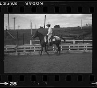 [Unknown Cowgirl on horseback]