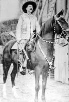 [Photograph of possibly Buffalo Bill Cody on horseback]