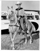 Bob Wills [on horseback next to bus]