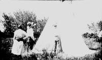 teepee going up Quarter Circle U Ranch 1928