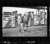 [Unknown cowboy with his horse]