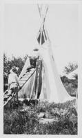 Assembling a teepee Aug 1928 Quarter Circle U Ranch