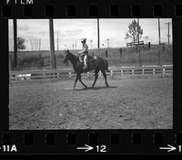 [Unknown cowgirl on horseback]