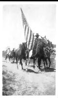 July 1928 Am Flag in Crow Native American Parade at Lodge Grass Rodeo