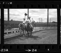 [Unknown cowgirls on horseback]
