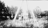 Assembling Mrs. Arnold's teepee Aug 1928 N Pickett