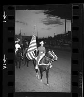 [Unknown Grand entry flag bearer]
