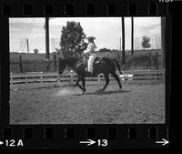 [Unknown cowgirl on horseback]