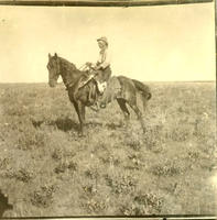 [Cowboy on horseback]