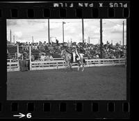 [Unknown Cowgirl on horseback]