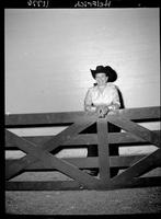 Janie Statz behind fence