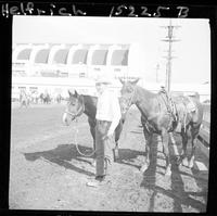 Tom Nesmith  (Pose)  standing by horse