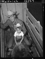 Guy Weeks Jr. and Billy Hand on a Brahma