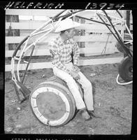 Gerald Roberts sitting on bull barrel