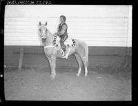 Karen Womack pose on horse