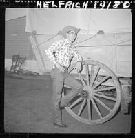 Benny Reynolds  standing by Wagon