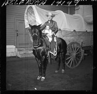 Pat Hogue & baby on horse  (Pose)