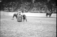 Unknown Rodeo clowns Bull fighting with unknown Bull