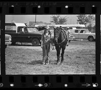 Unidentified Cowgirl with horse