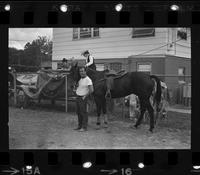 Unidentified Cowboy with horse
