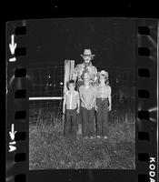 Unknown Rodeo clown with children