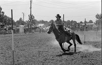 Unidentified rider in Pole bending event