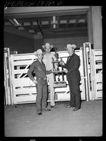 Hoss Inman presenting Hensley Trophy to Alvin Nelson