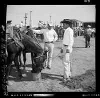 Byron & Gary Gist watering horses