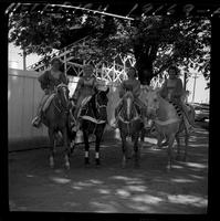 4 Trick Riders on Horses